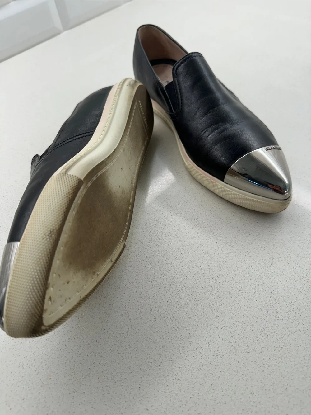 Miu Miu Black Leather Slip-On Flats with Silver Cap Toe